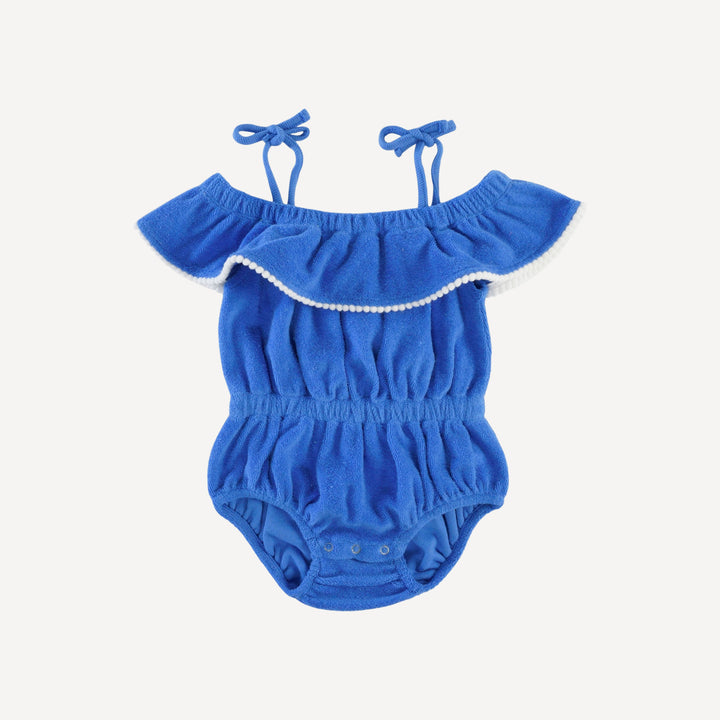 spaghetti tie ruffle off shoulder bubble with pom poms | vivid blue | organic cotton terry