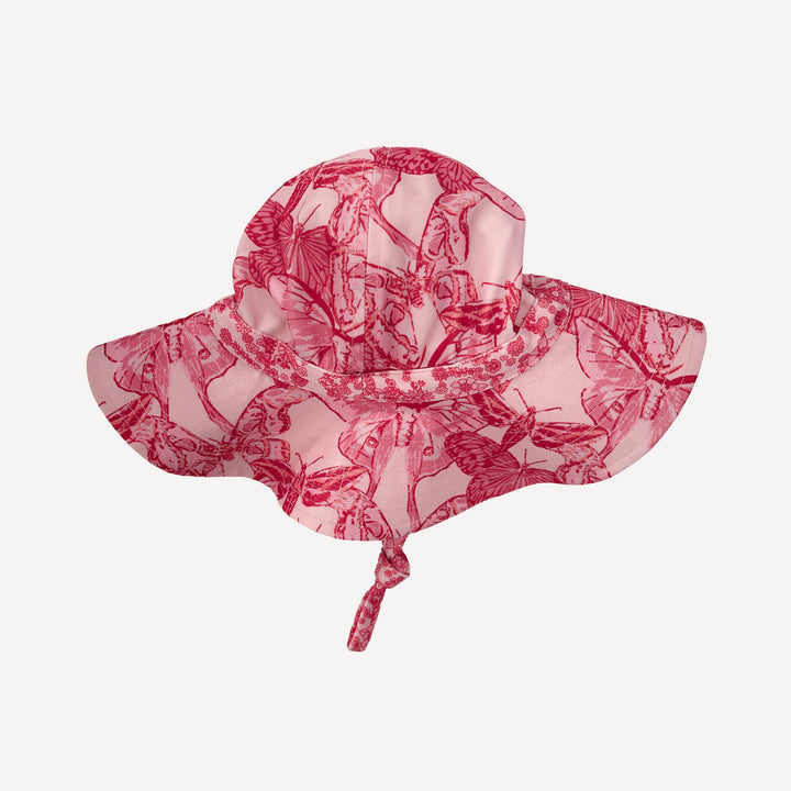 sun hat | pink moth wallpaper | swim