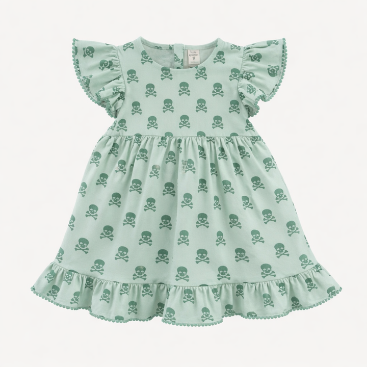 flutter sleeve pom pom pinafore dress | green skulls | organic cotton interlock