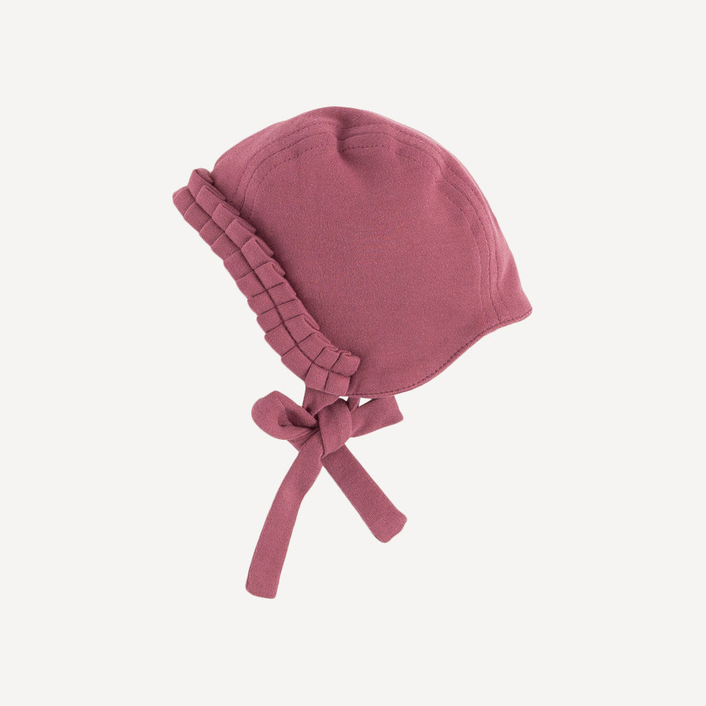 tiny ruffle bonnet | cherry | organic cotton interlock